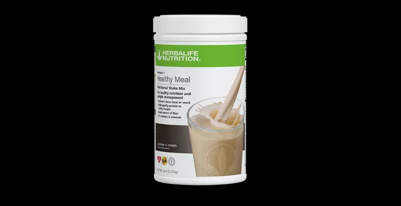 Herbalife product and notes on a kitchen counter for a rules-aligned home business plan